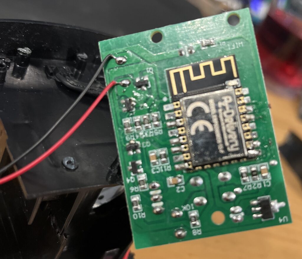 Close up of the fish feeder circuit board showing where the module sits